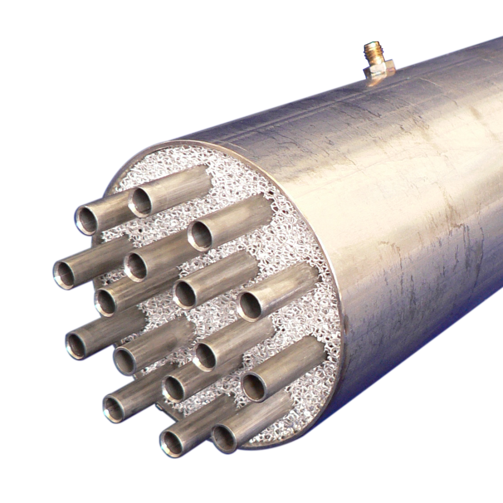Photo of a large shell-and-tube heat exchanger with foam between the shell and the tubes